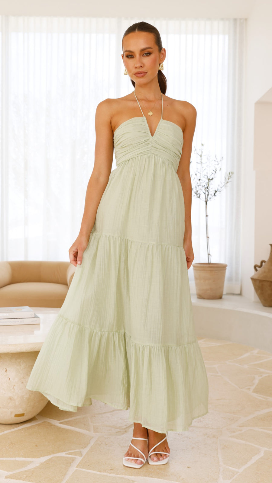 Sage green moss cotton maxi dress with halter neckline and tiered skirt