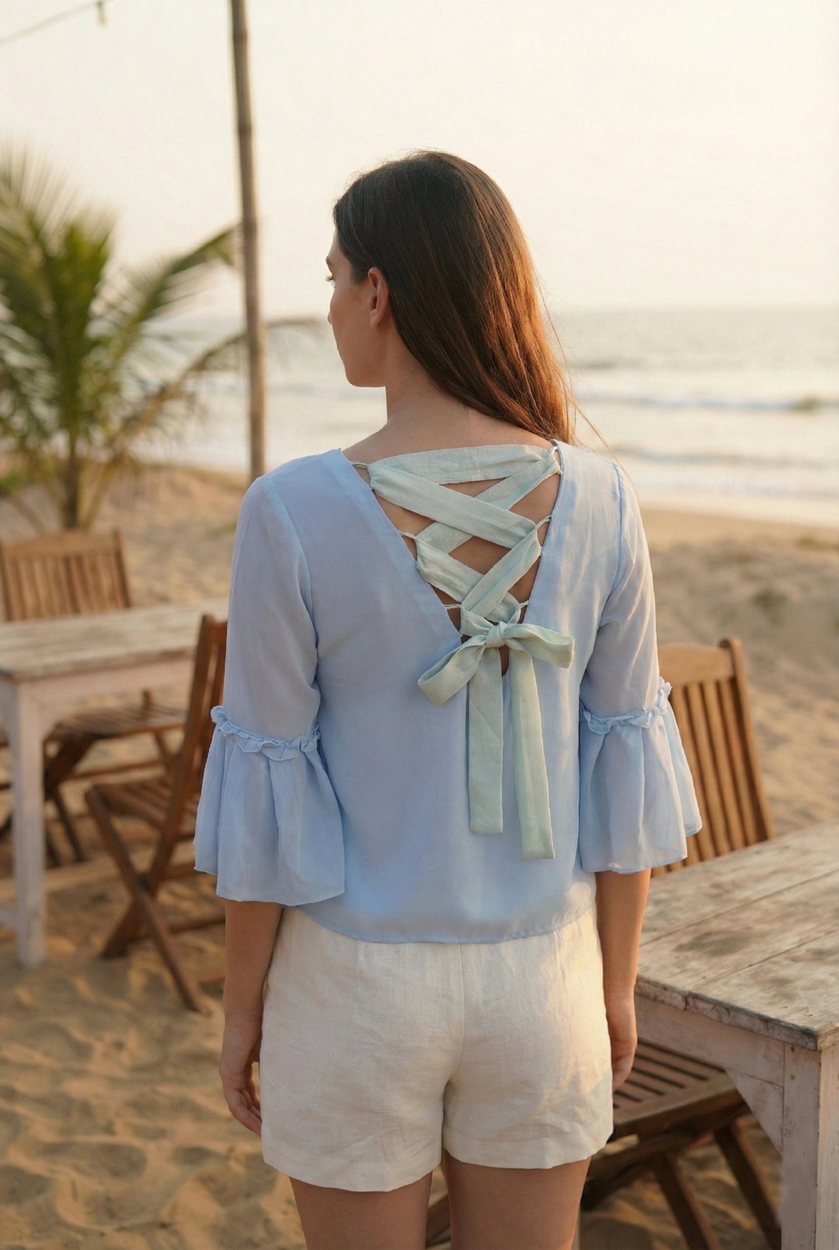 Powder Blue Georgette Top with Hand-Embroidered Moon Motifs