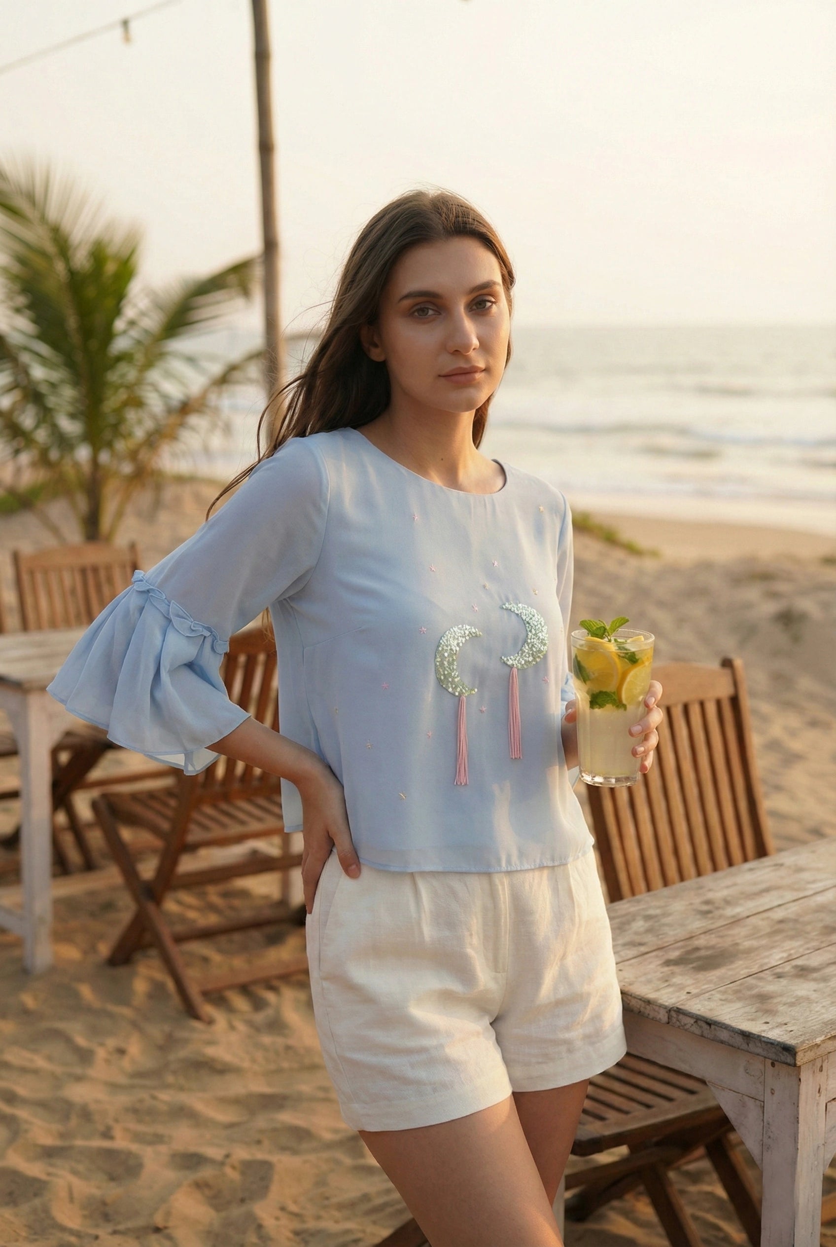 Powder Blue Georgette Top with Hand-Embroidered Moon Motifs