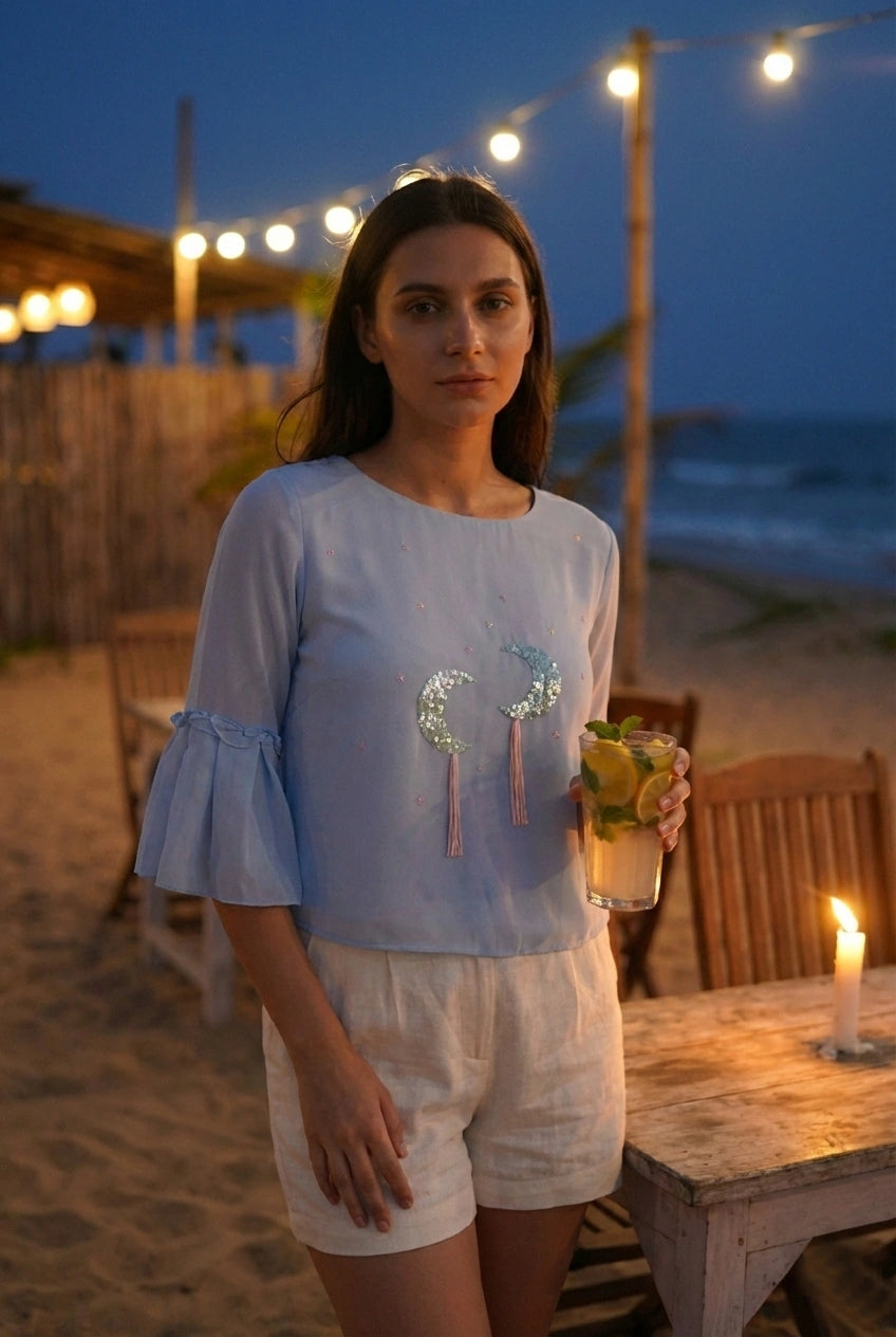 Powder Blue Georgette Top with Hand-Embroidered Moon Motifs