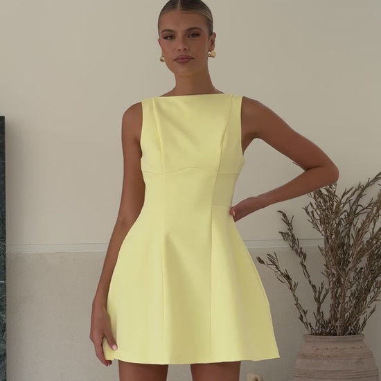 Butter yellow banana crepe sleeveless mini dress with A-line silhouette