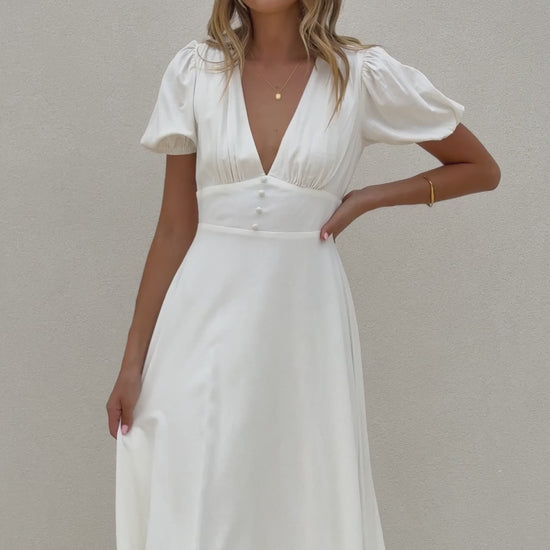 White crepe midi dress with puff sleeves and V-neckline