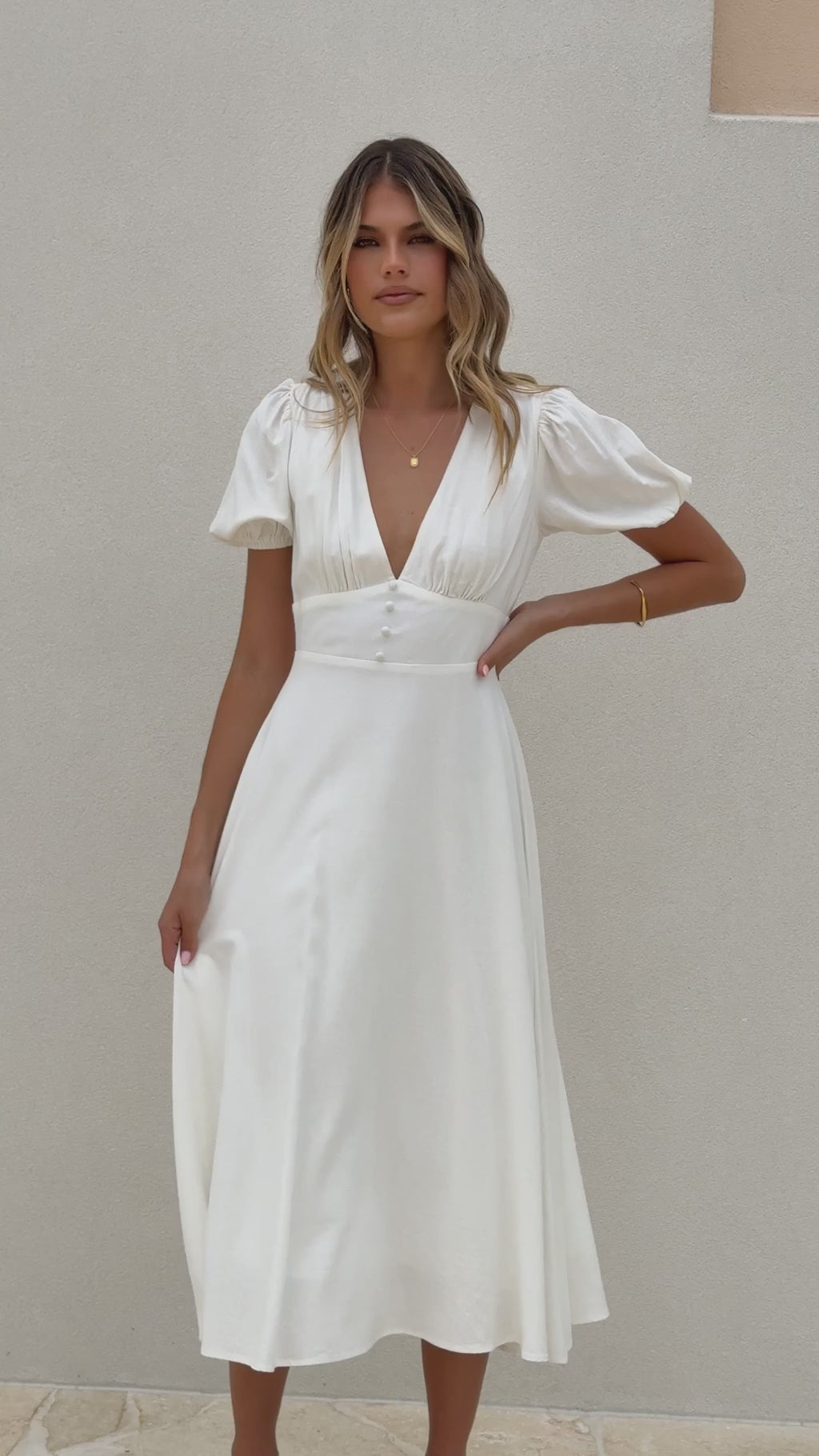 White crepe midi dress with puff sleeves and V-neckline