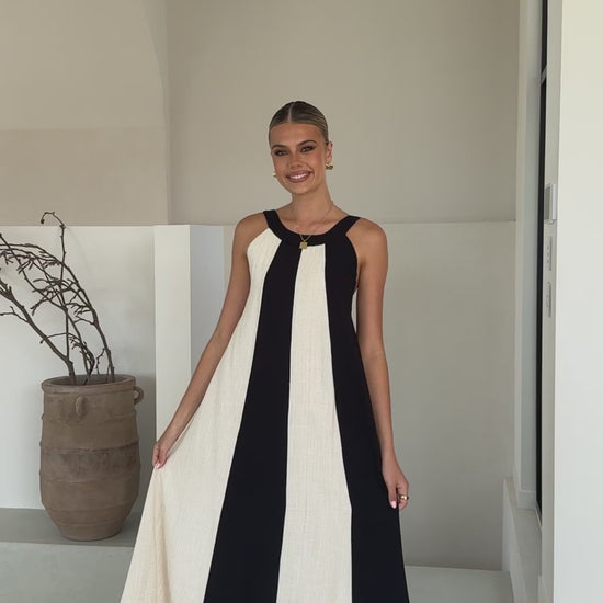 Black and white colorblock linen dress with gathered neckline and wide straps