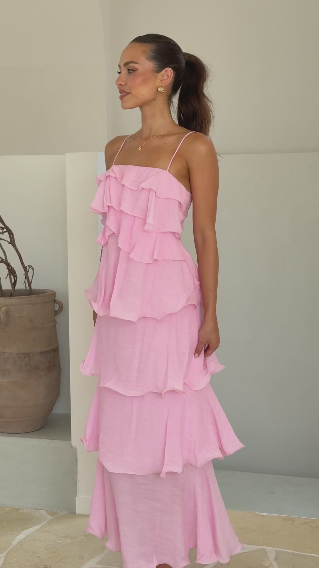 Pink crepe maxi dress with layered ruffles and spaghetti straps