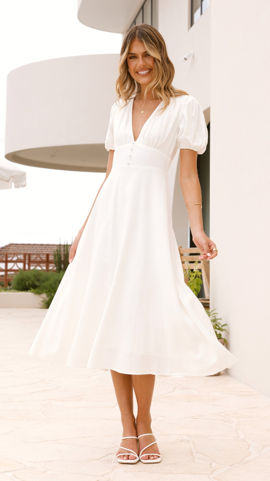 White crepe midi dress with puff sleeves and V-neckline