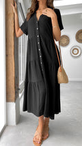 Black linen midi dress with short sleeves, tiered skirt, and button-down front