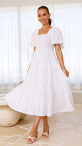 White midi dress with smocked front and back, puff sleeves, and tiered skirt