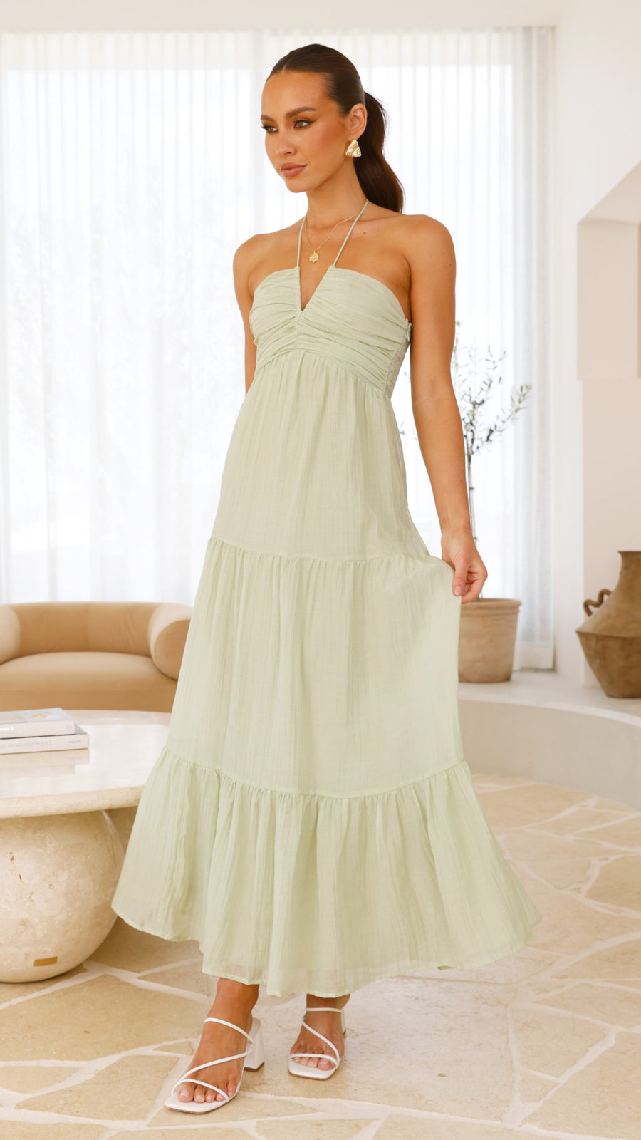 Sage green moss cotton maxi dress with halter neckline and tiered skirt