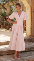 Baby pink cotton poplin maxi dress with puff sleeves and pleated skirt