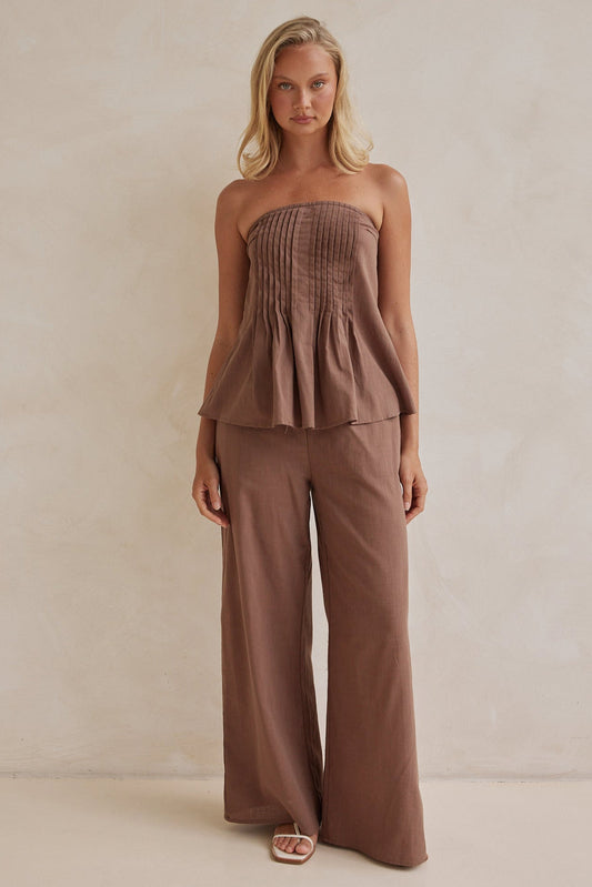 Brown linen co-ord set with strapless pleated top and wide-leg pants