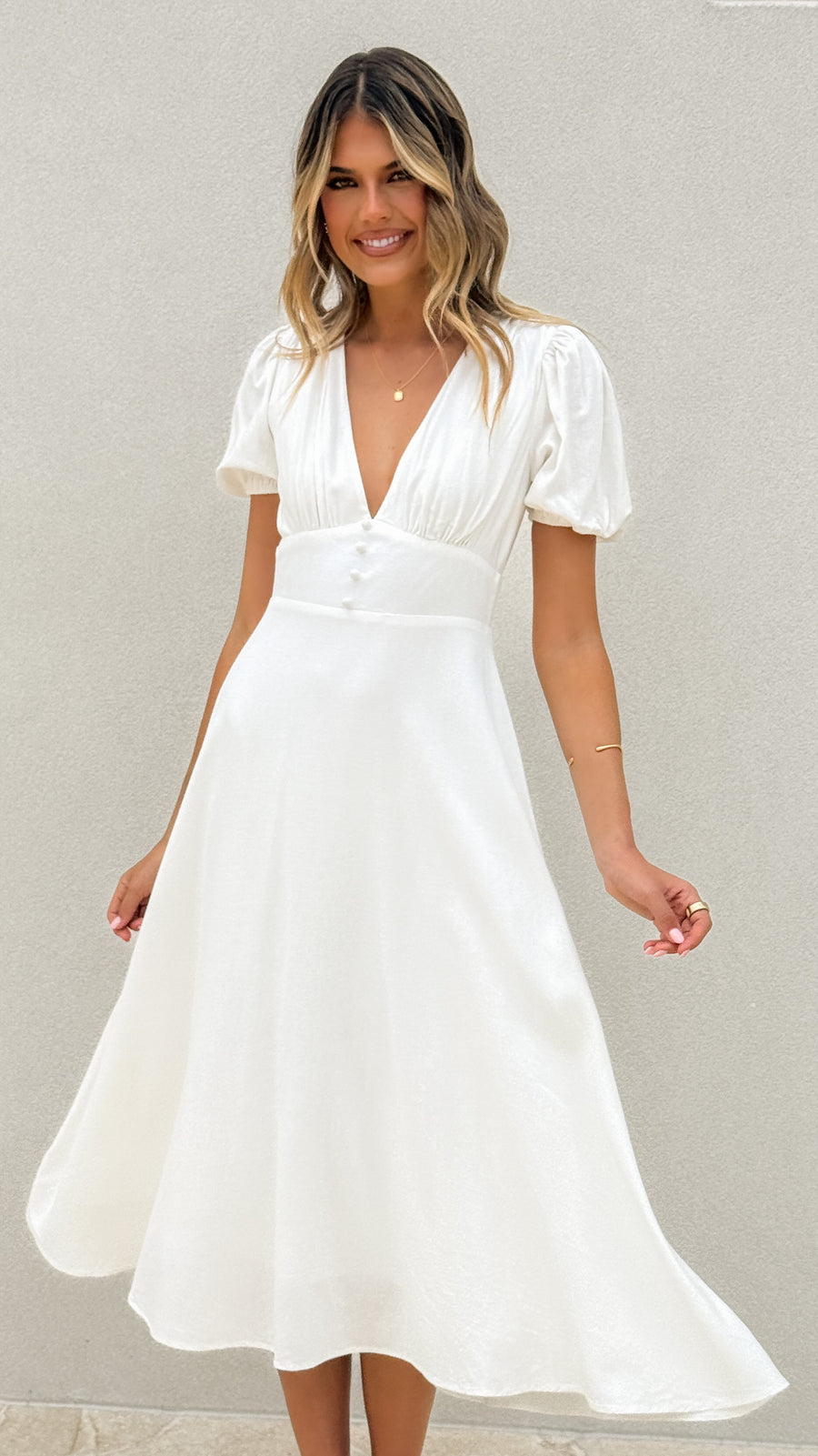 White crepe midi dress with puff sleeves and V-neckline