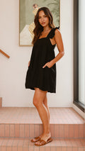 Black cotton mini dress with ruffle straps and square neckline