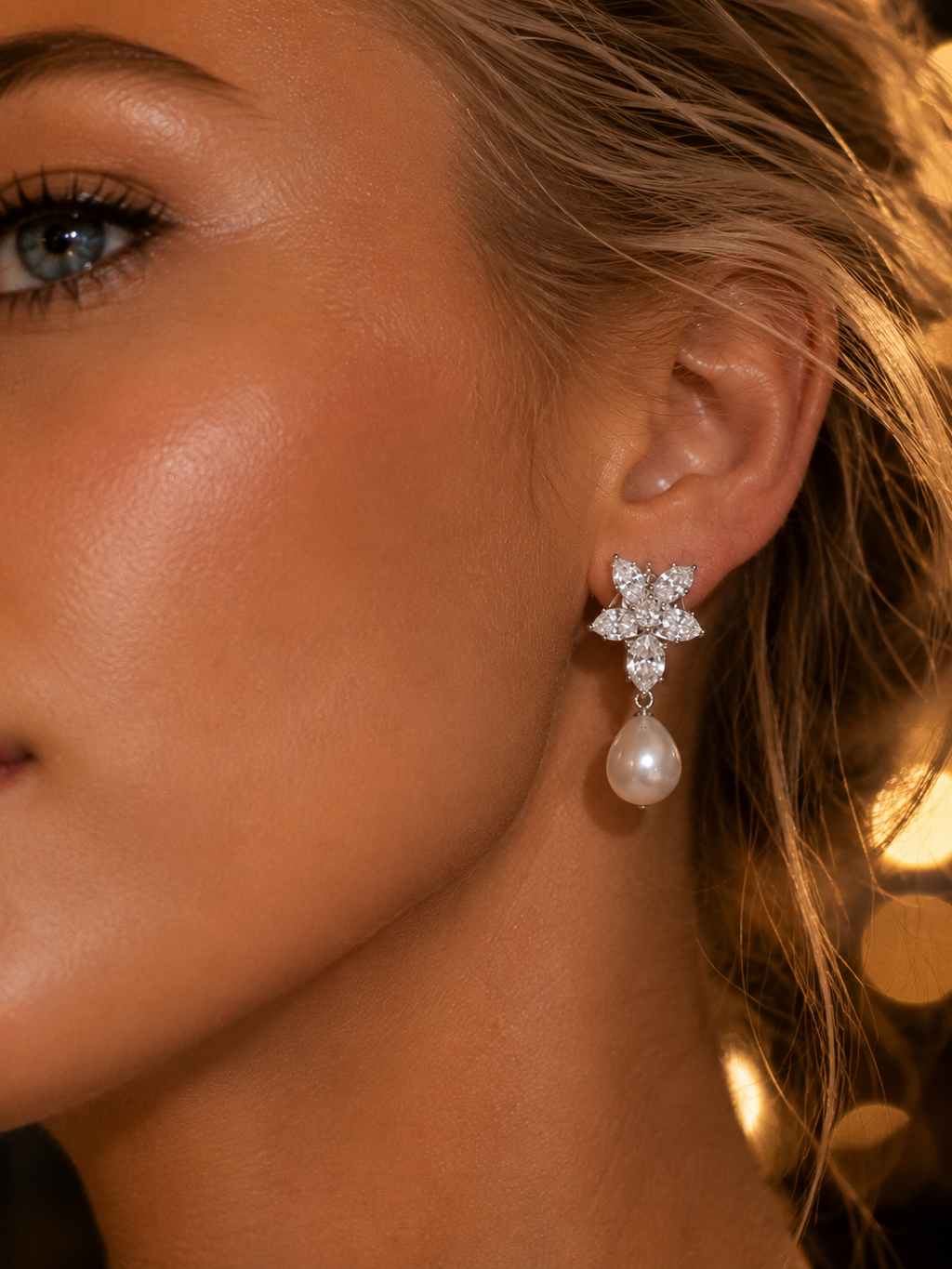 Orecchini di diamanti con gocce di perle