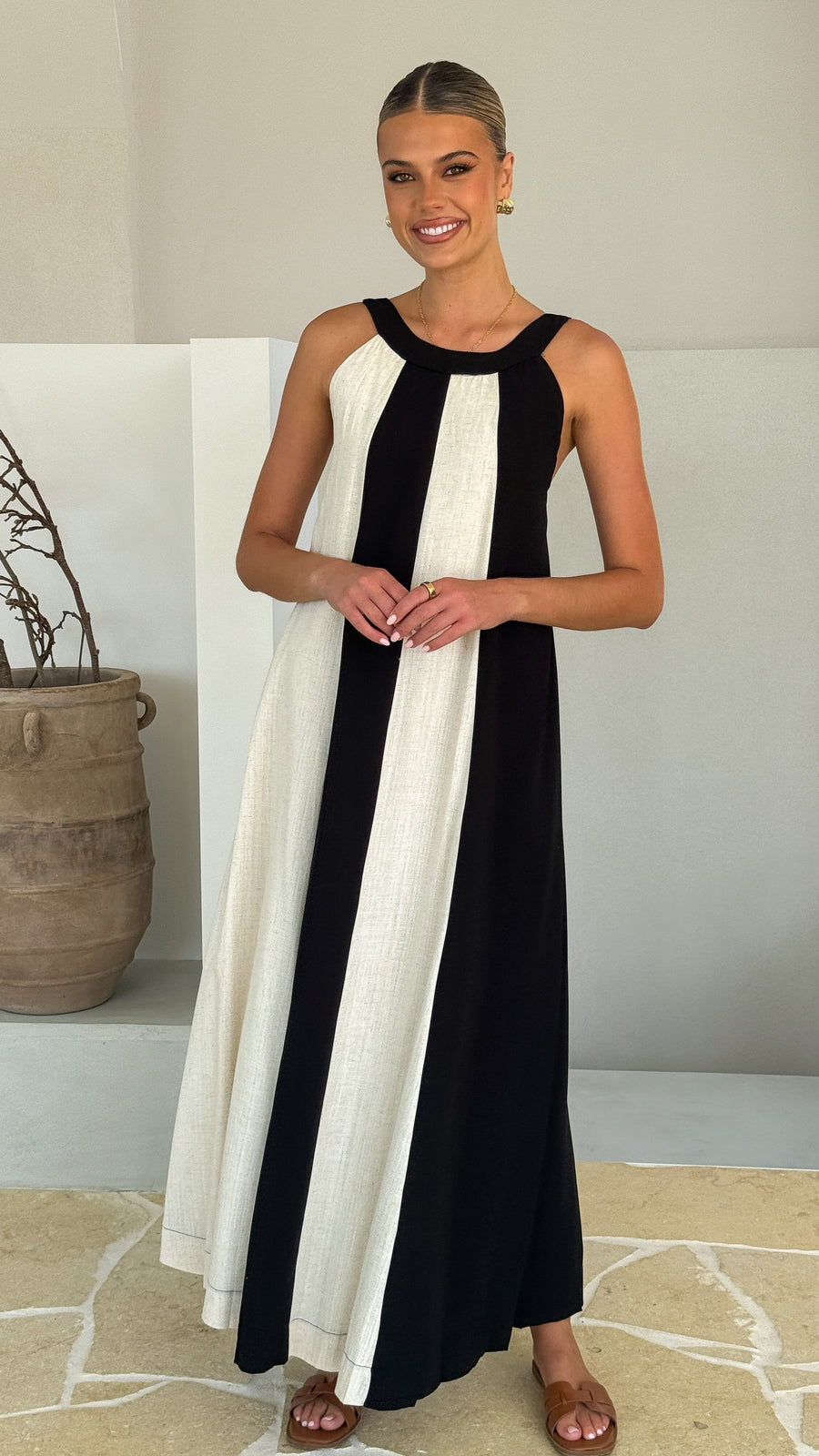 Black and white colorblock linen dress with gathered neckline and wide straps